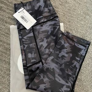 NWT-Zyia. Black camo metallic pocket light and tights!